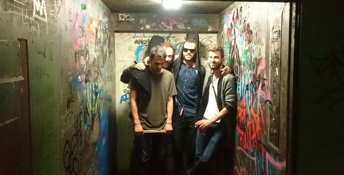Photo of me and 3 other jam mates in a gratified elevator