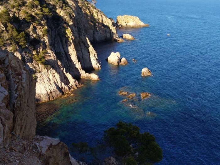 Photo of Costa Brava cliffs and the blue sea