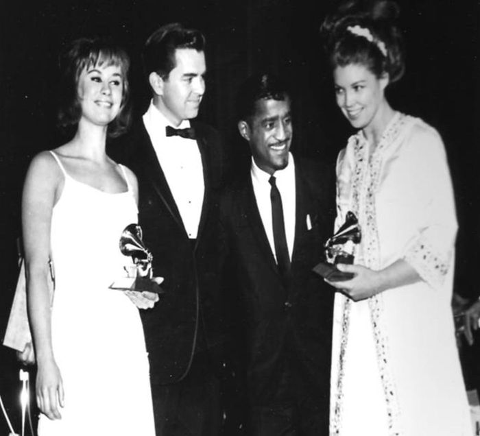 Photo of Astrud Gilberto, Creed Taylor, Sammy Davis Jr., and Monica Getz holding Grammy awards
